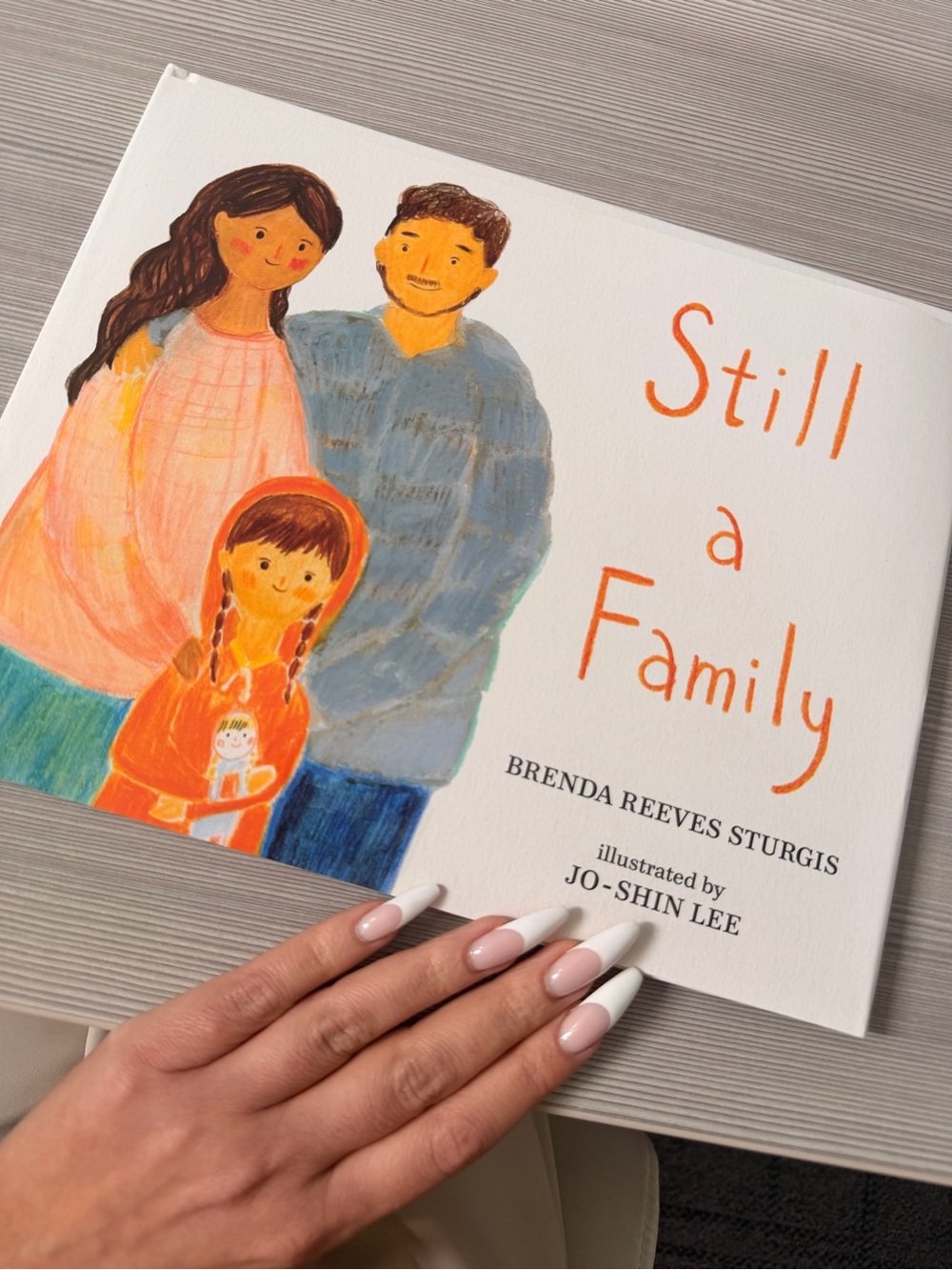 Still a Family Illustrated Book - White & Orange Cover
